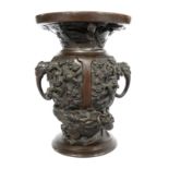 A Japanese bronze twin handled vase