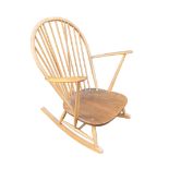 An Ercol elm and ash rocking chair, 75 by 82 by 95cm high.