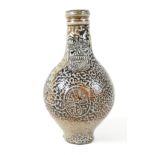 A small 17th century bellarmine, or Bartmann jug,