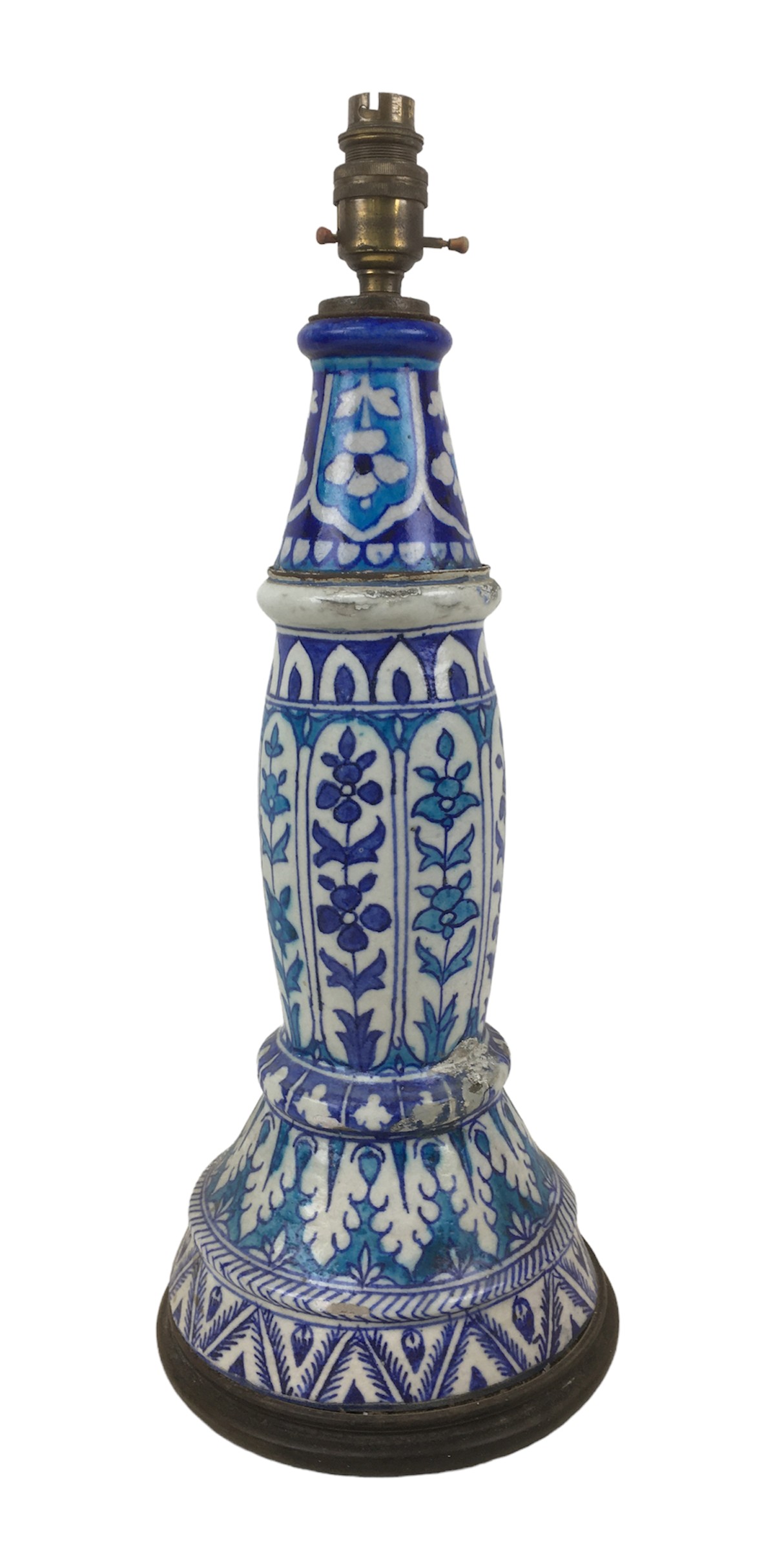 A Persian / Continental ceramic lamp base, wired for electricity in the early 20th century,