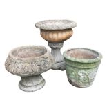 Three assorted 20th century garden stoneware planters, including a planter with gadrooned bowl,