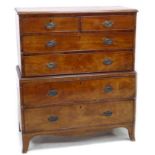 A small George III mahogany chest on chest, with two short over four graduating long drawers, cock