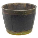 A brass-bound fire bucket, 38 by 38.5 by 28.5 cm high.