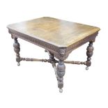 A Flemish 19th century oak dining table, rectangular surface, carved decoration, raised on