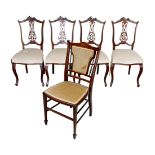 A group of five 20th century mahogany chairs, including a set of four mahogany dining chairs with