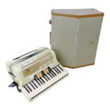 A vintage Marinucci piano accordion, with original case.