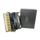 A vintage Frontalini piano accordion, with original fitted case.