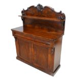 A Victorian mahogany chiffonier, with double doors to its base enclosing a single shelved