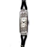 An Art Deco platinum and diamond cocktail watch