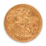 A George V gold sovereign, 1913.