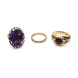 Three 9ct gold rings, comprising a gypsy set red stone ring, the round cut stone, 6.5mm, with two