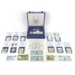 A collection of American and Canadian coins, including seven silver $1 coins, comprising 1988, 1991,