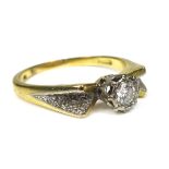 An 18ct gold illusion set diamond solitaire ring, round cut stone size 3mm diameter, size T, 5.2g.