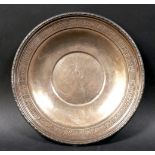 An American Sterling silver dish, circular form with cast floral decoration to the borders,