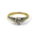 An 18ct gold diamond solitaire ring, with platinum mounts, the round faceted cut stone, 5.2 by 3.