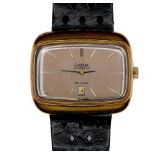 A vintage Omega De Ville gold plated gentleman's wristwatch, rectangular silvered dial with gold and