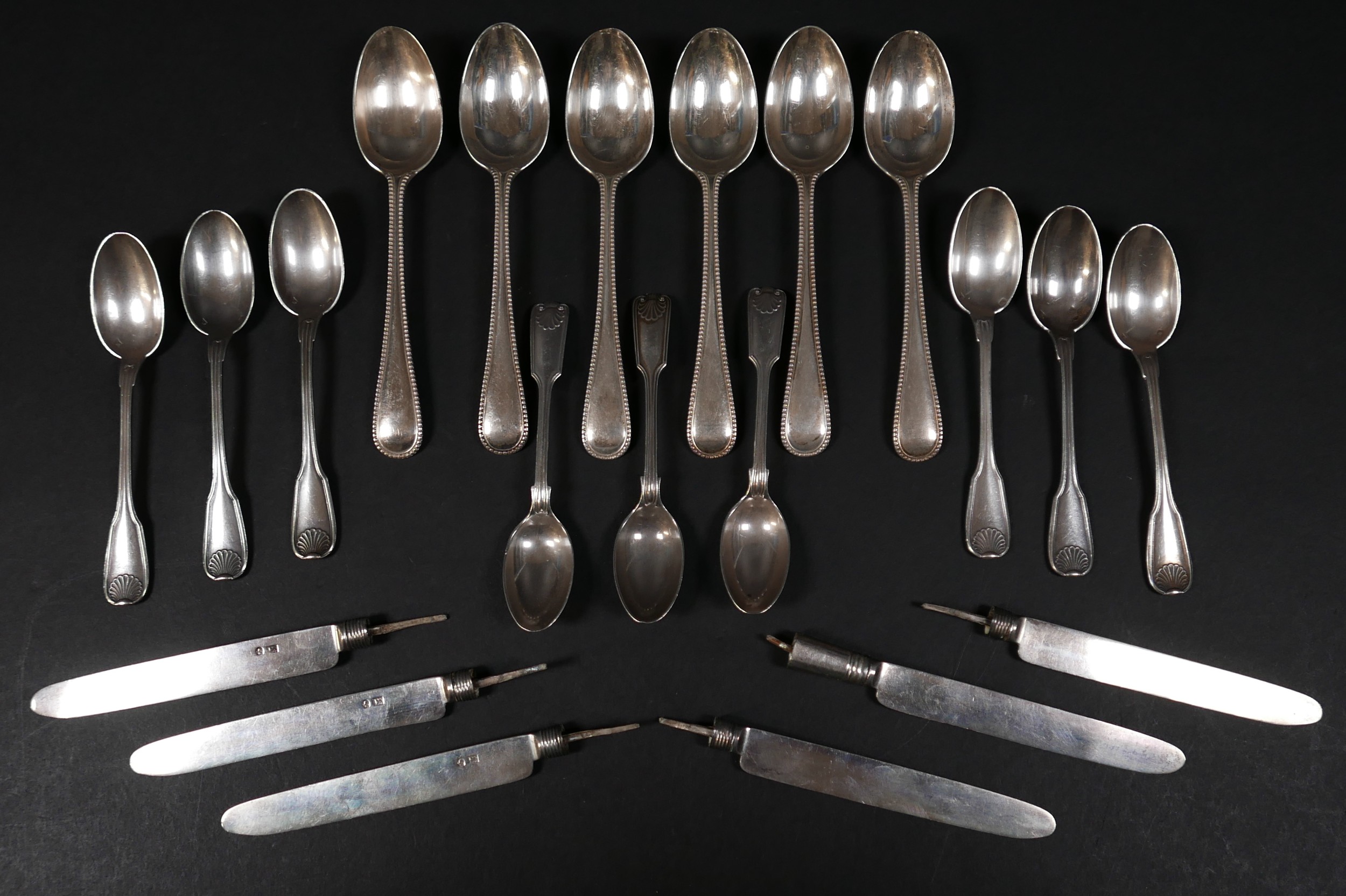 A collection of Georgian and later silver flatware, comprising a set of six fruit knife blades, 3.