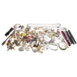A collection of costume jewellery and silver items, including a heavy kerb link chain, various