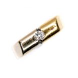 An 18ct bi-coloured gold and diamond ring, the central brilliant cut diamond of approximately 0.