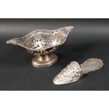 A late Victorian novelty silver hanging wall pocket, in the form of a slipper, with embossed