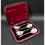 A cased set of four George V silver apostle serving spoons, Wakely & Wheeler, London 1911, each 19cm