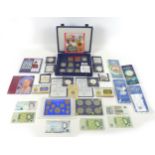 A collection of British coins, including seven 1993 commemorative silver coins, a Queen Elizabeth,