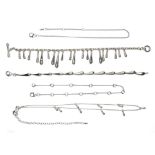 A group of silver jewellery, including a teardrop necklace, two teardrop bracelets, both 18.5cm, and