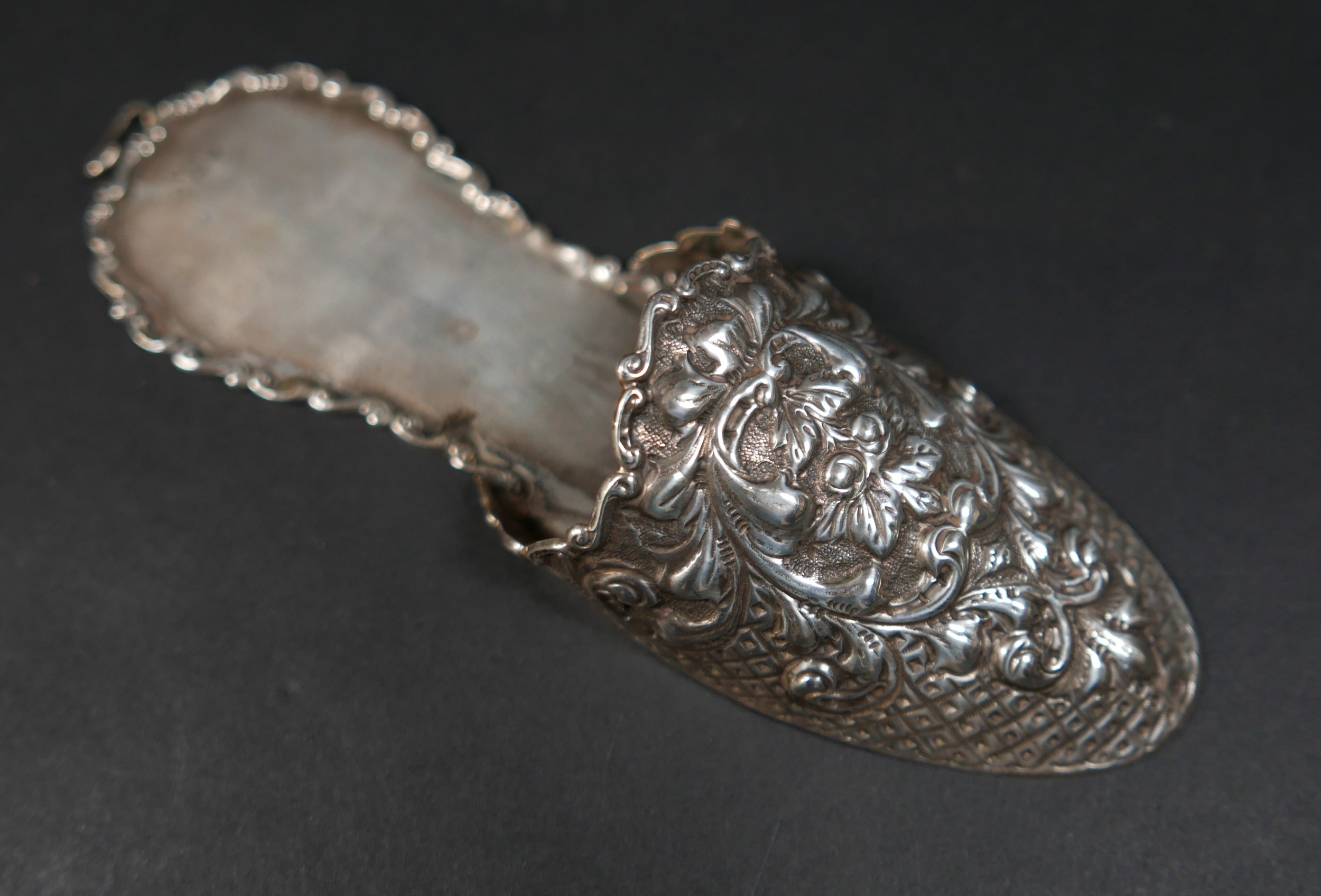 A late Victorian novelty silver hanging wall pocket, in the form of a slipper, with embossed - Image 2 of 6