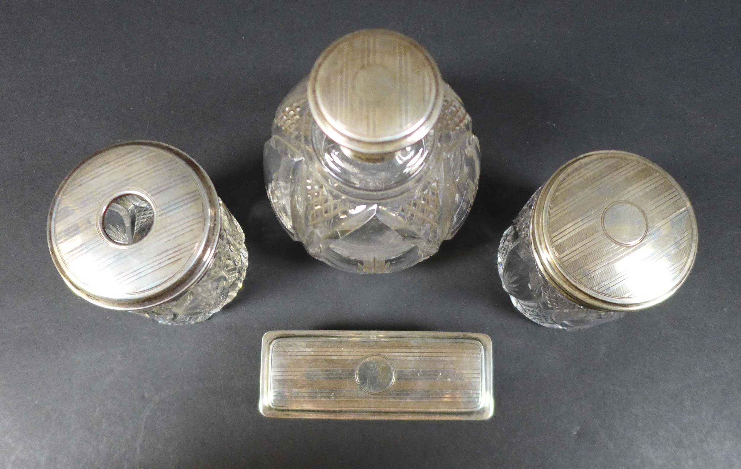 A collection of silver lidded cut glass dressing table jars, including a four piece set by - Image 4 of 7