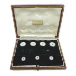 A cased part set of 9ct white gold and sapphire dress studs and buttons, the princess cut