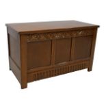 A vintage stained oak blanket chest, lift lid, carved decoration, 94 by 47 by 56cm high.