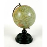 A Phillips Terrestrial Globe, 6 inch model, circa 1950's, on a stepped circular base, 24.5cm high.
