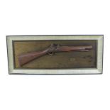 A vintage piece of wall art, depicting a blunderbuss in relief, being a lengthways resin cast,