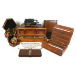 A collection of scientific instruments and equipment, including a WWII brass telescope, inscribed '