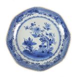 A Chinese Export porcelain dish, 19th century, decorated in underglaze blue, depicting a table