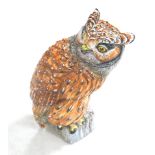 A modern Italian ceramic sculpture, modelled as an owl, 24 by 31 by 51cm high.