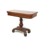 A 19th century mahogany card table, with blue baize, raised upon a single baluster form column and a