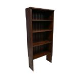 A freestanding bookcase, closed back, three shelves, 69 by 26 by 148cm high.