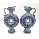 A pair of 19th century German Weserwald salt glazed moon flask ewers, with single handle, loop to