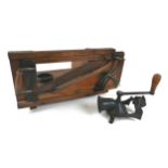 A Victorian / Edwardian bread slicer, with wooden frame metal fittings, horizontal guillotine