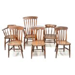 A group of six 19th and early 20th century chairs, comprising three oak Windsor chairs, stamped W or