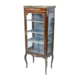 A 19th century mahogany display cabinet, with gilt metal mounts, glazed door and sides enclosing