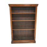 A Victorian mahogany bookcase, closed back, with four adjustable shelves, 97.5 by 31 by 145cm high.