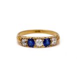 A GOLD, DIAMOND AND SAPPHIRE FIVE STONE RING