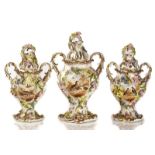 A COALBROOKDALE-TYPE GARNITURE OF THREE PORCELAIN TWO-HANDLED VASES AND COVERS (6)
