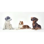 THREE LARGE ROYAL COPENHAGEN FIGURES OF DOGS (3)