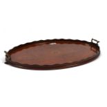 AN EDWARDIAN INLAID HAREWOOD AND MAHOGANY OVAL TRAY