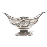 A SCOTTISH SILVER TWIN HANDLED PEDESTAL BASKET