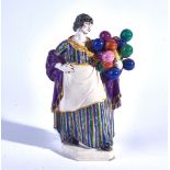 CHARLES VYSE ( 1882-1971) `THE BALLOON SELLER', A CHELSEA POTTERY FIGURE