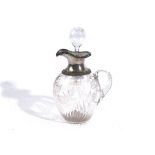 A LATE VICTORIAN SILVER MOUNTED GLASS CLARET JUG